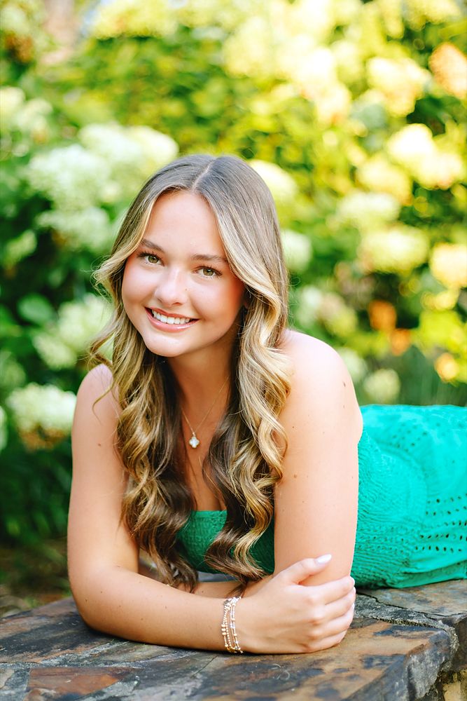 Portrait by the hydrangeas