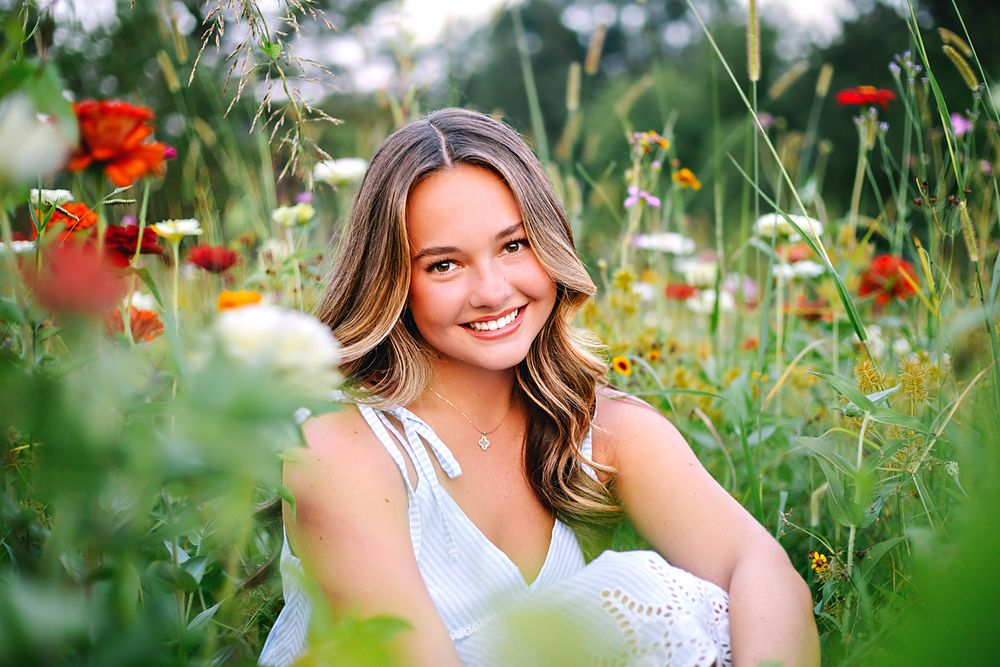 Smiling portrait among wildflowers